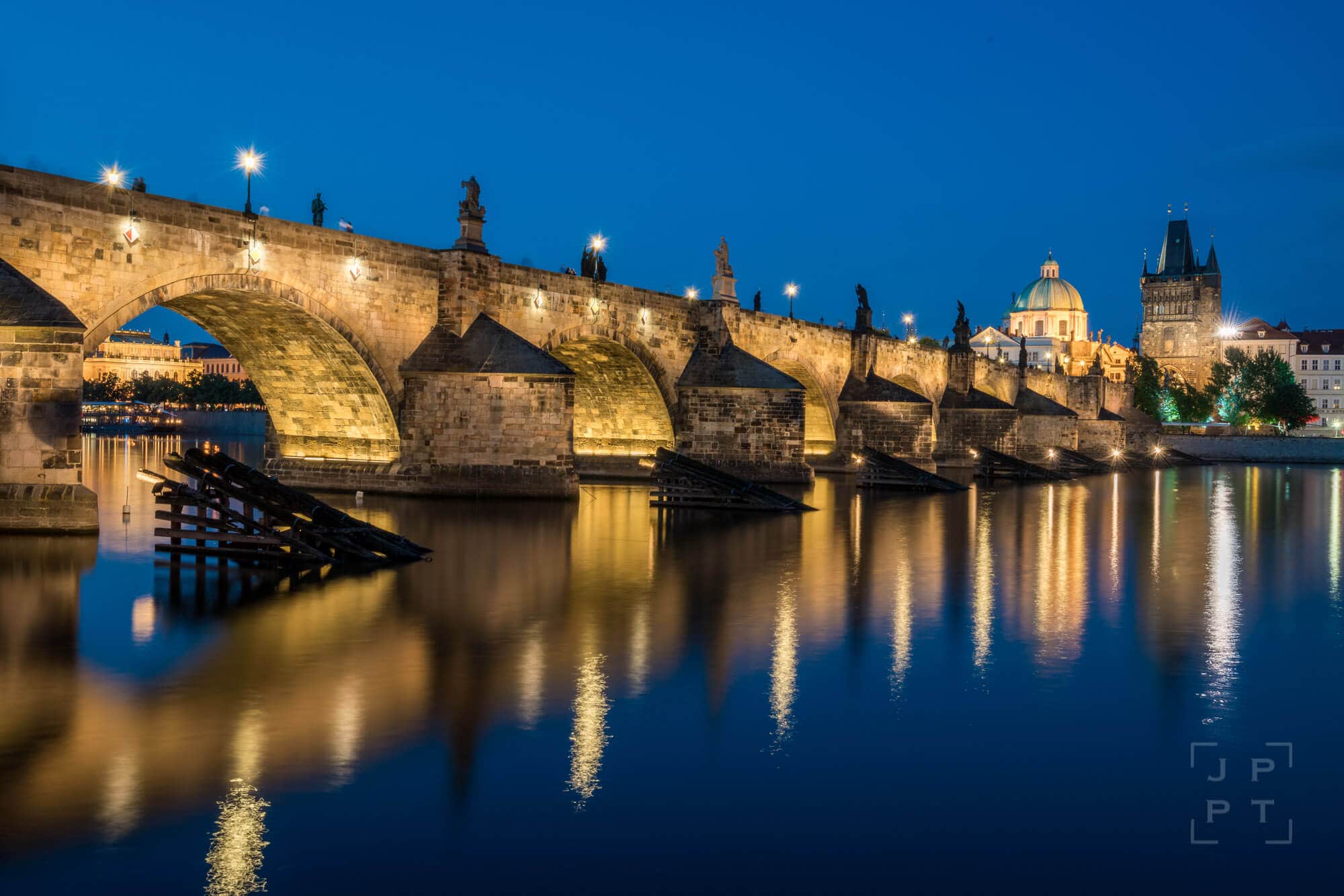 The grand finale of the night tour is the illuminated Charles Bridge, Prague